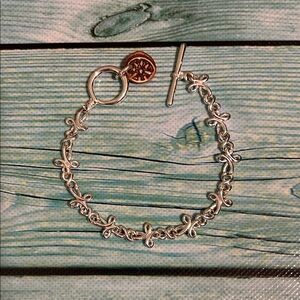 The StarFish Story Bracelet Silver with Gold Accent